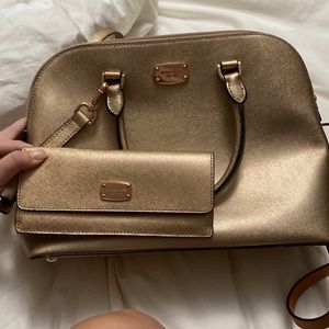 Michael Kors rose gold cross body bag and wallet
